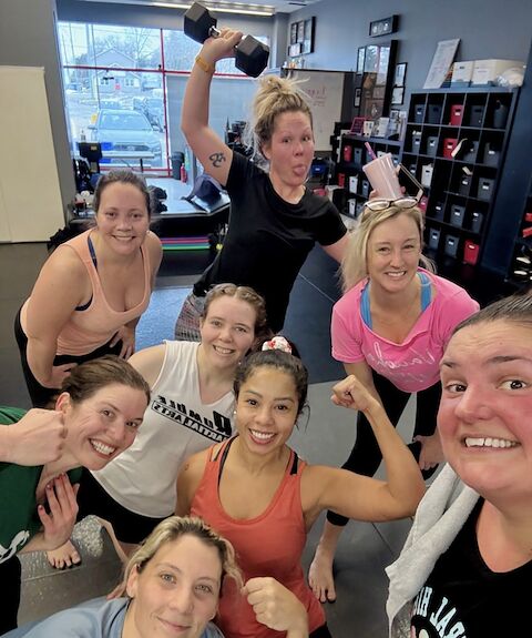 The Battle Girl Bootcamp group celebrating after a class in Keswick.
