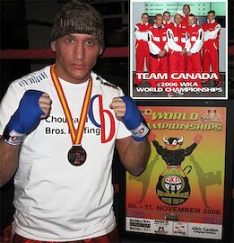 Kru Jones's Team Canada kickboxing medals on display.
